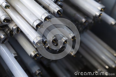 Stack of disused neon lamp tubes Stock Photo