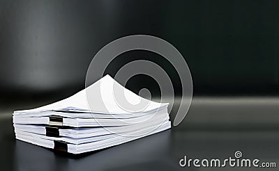 Stack documents or files on black background. Stock Photo