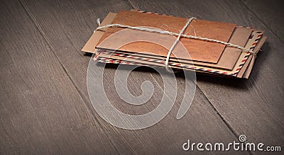 Stack of envelopes on wooden table Stock Photo