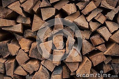 Stack of firewood. Chopped logs background. Woodpile background. Stacked wood. Wooden texture. Logging storage Stock Photo