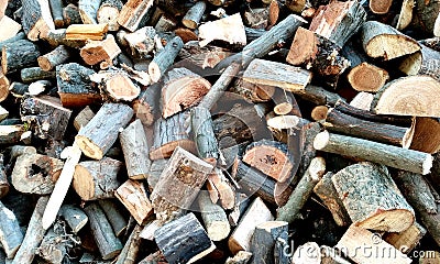 Stack of firewood.The logs of fire wood.Wood chips. Stock Photo