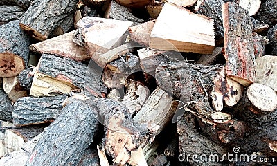 Stack of firewood.The logs of fire wood.Wood chips. Stock Photo