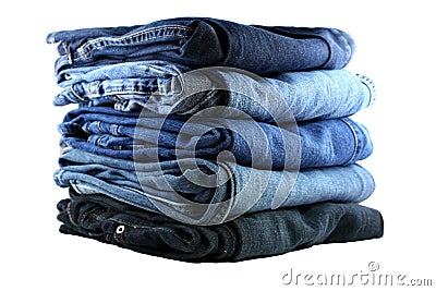 Stack of five blue jeans Stock Photo