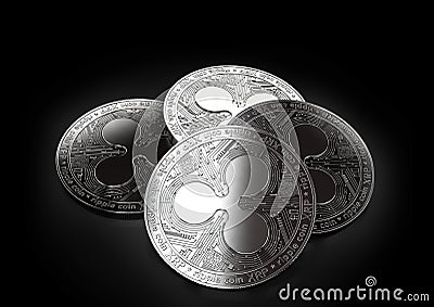 Stack of four silver Ripple coins laying on the black background Editorial Stock Photo