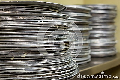 Stack of pizza pans Stock Photo