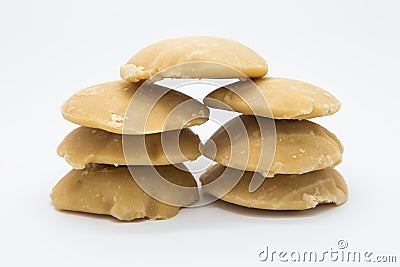 Stack hard palm sugar on white Stock Photo