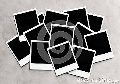 Stack of instant photos Mockup. Pile of retro photographs on concrete 3D rendering Stock Photo