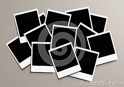 Stack of instant photos Mockup. Pile of retro photographs on concrete 3D rendering Stock Photo