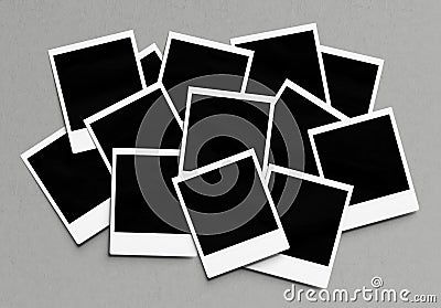 Stack of instant photos Mockup. Pile of retro photographs on concrete 3D rendering Stock Photo