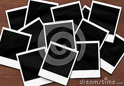 Stack of instant photos Mockup. Pile of retro photographs on wooden 3D rendering Stock Photo