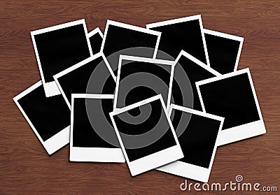 Stack of instant photos Mockup. Pile of retro photographs on wooden 3D rendering Stock Photo