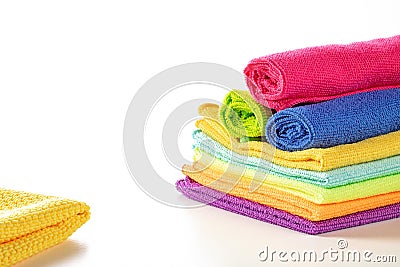 Stack of kitchen microfiber towels in bright colors on a white background Stock Photo