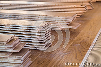 Stack of laminated wooden flooring boards Stock Photo