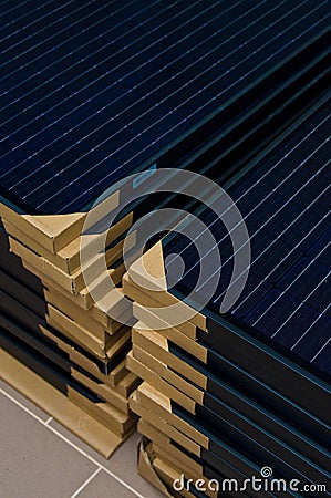 Stack of new solar panel ready for installation Stock Photo