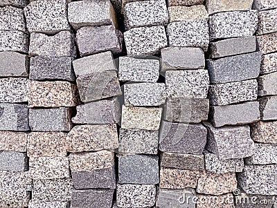 Stack natural granite stones for sidewalk construction. building material Stock Photo