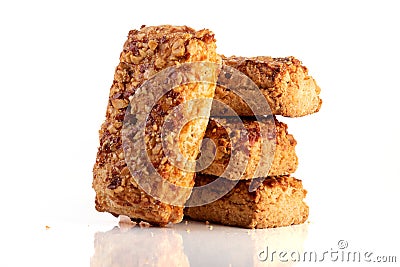 Stack oatmeal cookies cinnamon with nuts isolated on white Stock Photo