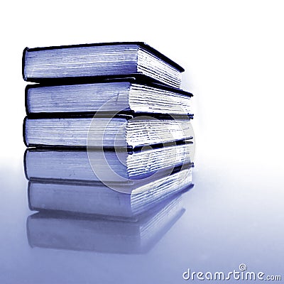 Stack of Old Books Black and White Reflection Stock Photo