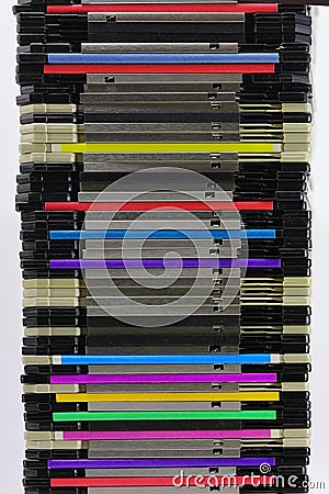 stack of old magnetic floppy disks used to save data from the first personal computers Stock Photo