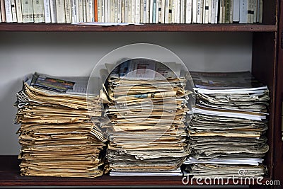 Pile of old newspapers in a stack Editorial Stock Photo