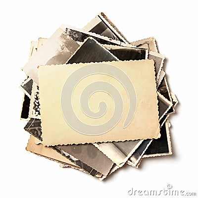 Stack old photos isolated on white background. Mock-up blank paper. Postcard rumpled and dirty vintage Stock Photo