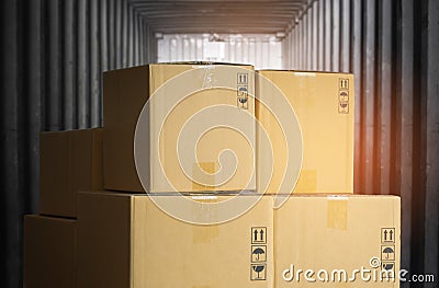 Stack of Package Boxes inside Cargo Container. Shipment Freight Truck Transportation. Stock Photo