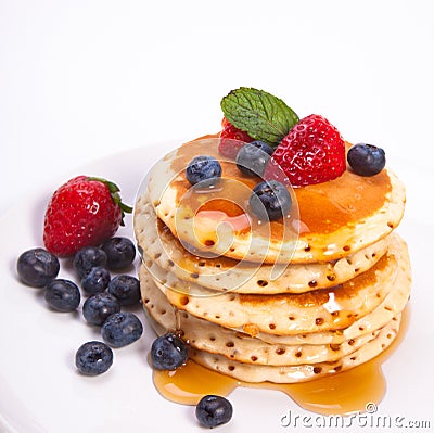 Stack of pancakes with fruits Stock Photo