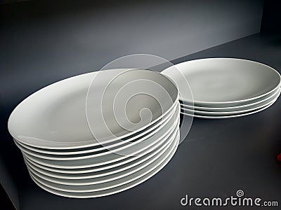 Stack or pile of realistic ceramic plates Stock Photo