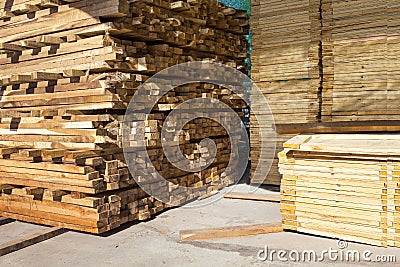 stack of pile wood bar in lumber yard factory use for construction wood industry Stock Photo