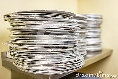 Stack of pizza pans Stock Photo