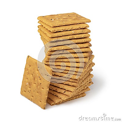 Stack of salted mini crackers with tomato and basil Stock Photo