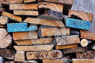 Stack of sawn boards with slices of different shapes. Stock Photo