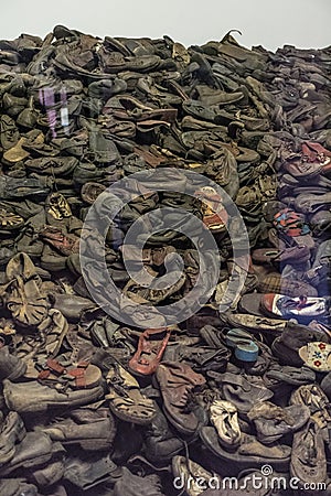 Oswiencim, Poland - September 21, 2019: Stack of shoes who once belonged to the jews and other prisoners from Auschwitz Editorial Stock Photo