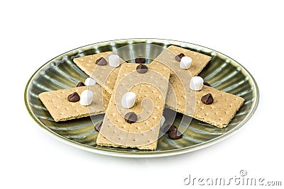 Stack of smore ingredients marshmallow graham cracker and chocolate chips Stock Photo