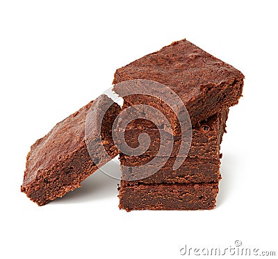 Stack of square baked pieces of brownie chocolate cake isolated on a white background Stock Photo