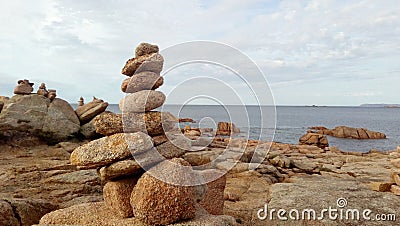 stack stones, apachetas, in the beach symbolizing interne balance Stock Photo