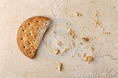 Stack of sweetmeal digestive biscuits closeup of a pile of biscuits on a texture background Stock Photo