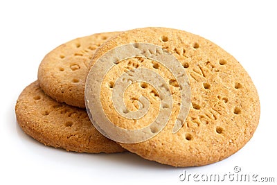 Stack of sweetmeal digestive biscuits isolated on white. Stock Photo