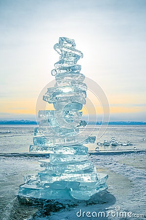 A stack of transparent ice floes on the surface of a frozen Lake Baikal in winter. Stock Photo