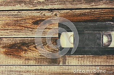 Stack of VHS video tape cassette over wooden background. top view photo Stock Photo