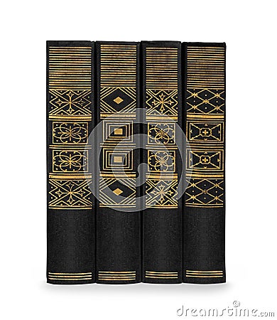 Stack of vintage books black with gold pattern Stock Photo