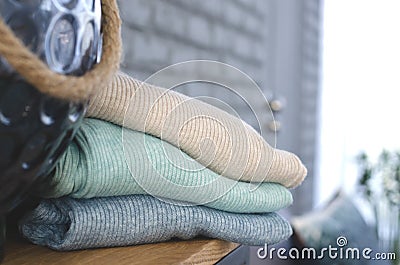 A stack of warm clothes. Stock Photo