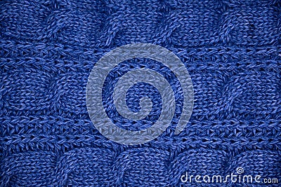 Stack of Warm knitwear close-up. Woolen knit texture as background Stock Photo