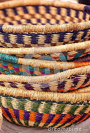 Stack of Wester African Baskets at a local outdoor market Stock Photo