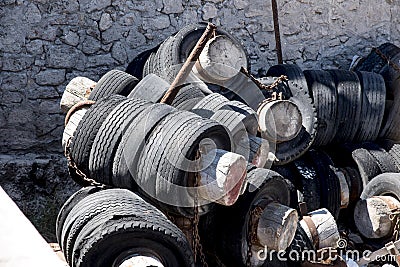 stacked and abandoned worn tires Stock Photo