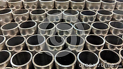 Stacked aluminum pipes Stock Photo