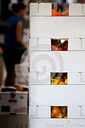 Stacked boxes full of colorful Stock Photo