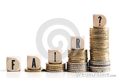 Stacked coins showing income difference between rich and normal incomes Stock Photo