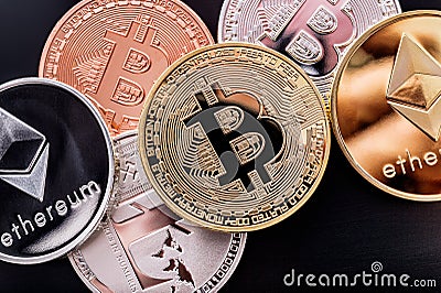 Stacked cryptocurrency coins Editorial Stock Photo