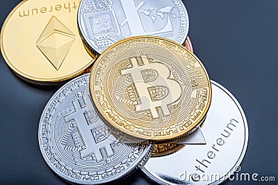 Stacked cryptocurrency coins Editorial Stock Photo