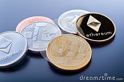 Stacked cryptocurrency coins Editorial Stock Photo